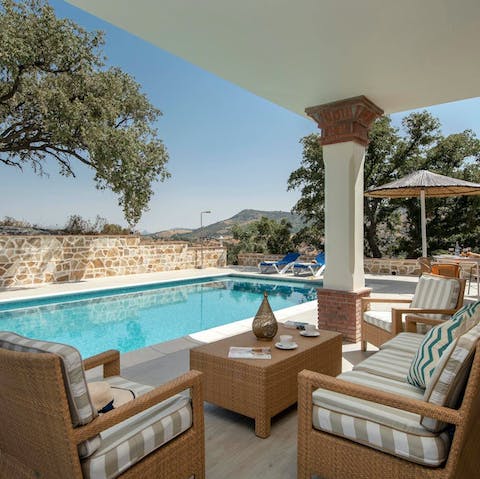 Share a bottle of wine at sundown on the covered terrace