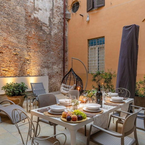 Nibble on Panzanella salad in the private courtyard