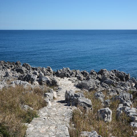 Walk for 30 metres through the Mediterranean garden and you'll reach the shoreline