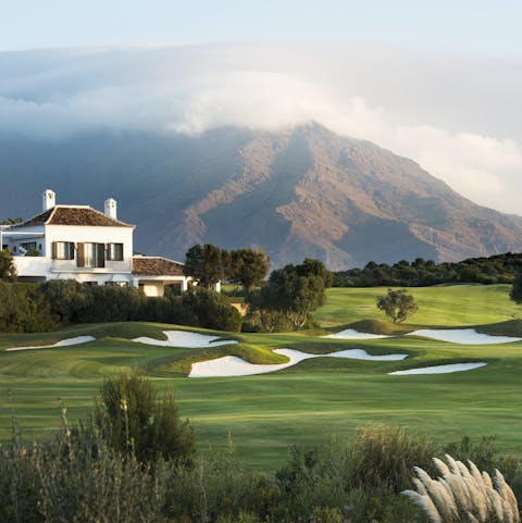 Play a round of golf beneath Andalusia’s stunning mountain-scape