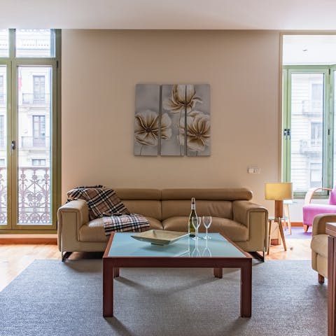 Take a moment to relax in the light-filled living space before heading out for brunch