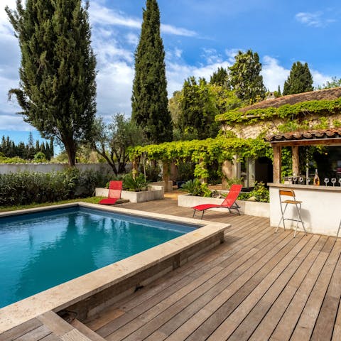 Toast the moment by the private pool