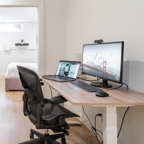 Work from home at one of the home's convenient work stations