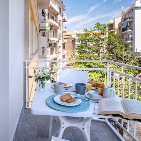 Have a cappuccino on the private balcony