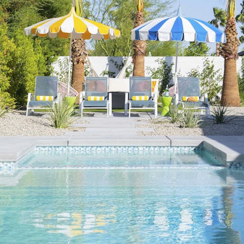 Cool off in the turquoise tiled swimming pool