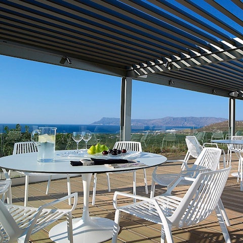Share a refreshing afternoon aperitif at one of the villa's many luxurious seating areas