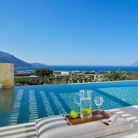 Cool off in the infinity swimming pool while perching on its Roman steps