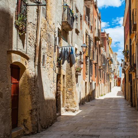 Explore historic Tarragona, a twenty-minute drive away