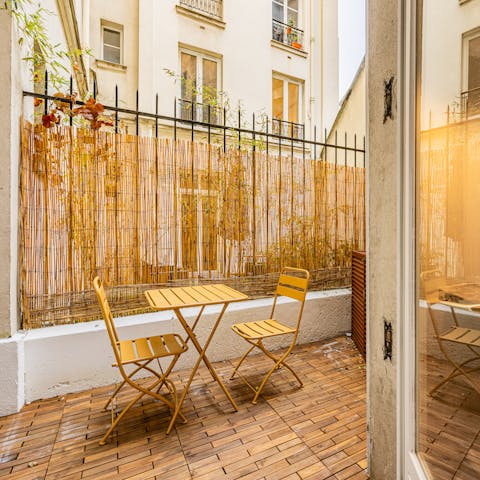Enjoy a glass of French fizz on the small terrace