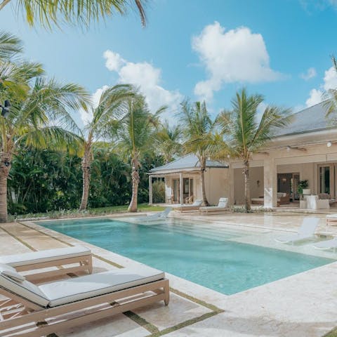Soak up the sun by the private pool and take refreshing dips in its glistening water