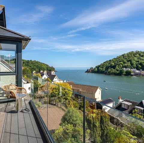 Have a drink on the balcony, looking out to sea