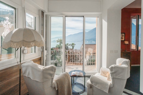 Get comfy in the armchair and watch the sun set into the lake
