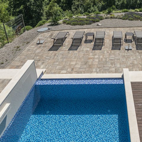 Take a dip in the private, heated pool