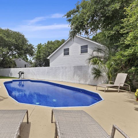 Lounge beside the private salt-water pool