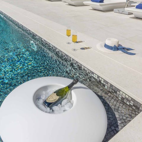 Pop open a bottle of bubbles after a day of island hopping on a private boat