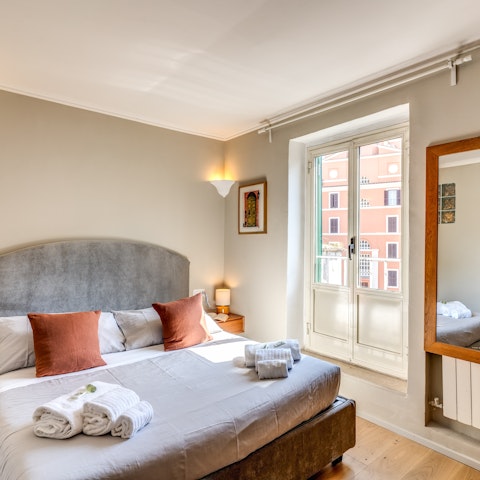 Peer out at the historic streets around you from traditional old windows