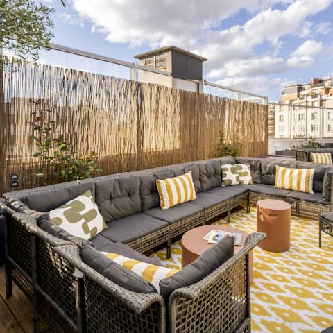 Relax on the private west-facing roof terrace with a glass of Champagne