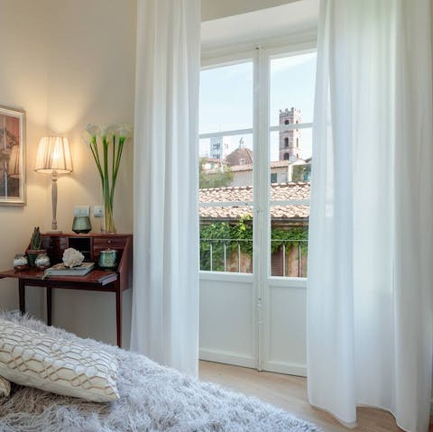 Wake up to views of the St Giovanni Bell Tower from your supremely comfortable bed