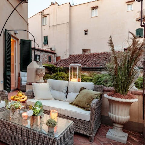 Sip glasses of Chianti on your elegant terrace as the sun sets over terracotta rooftops