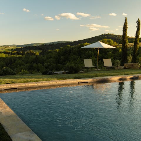 Swim in the private pool amid stunning scenery