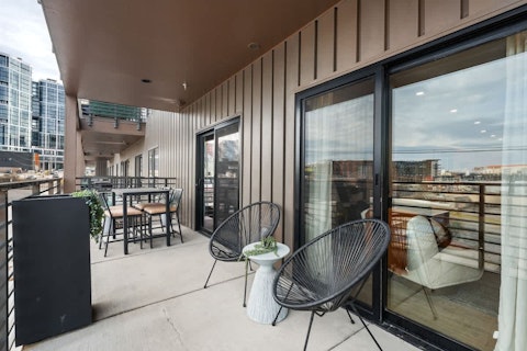 Step out and take in the Nashville skyline over morning coffee