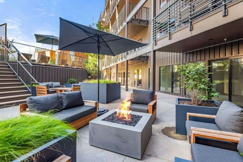 Gather round the shared fire pit as the evening cools