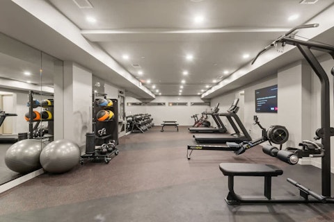 Train in the well-equipped building gym without leaving home