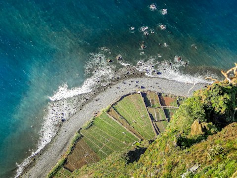 Stand on Cabo Girão's glass-floored skywalk above Europe's highest sea cliff, a short drive away