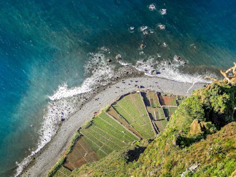 Stand on Cabo Girão's glass-floored skywalk above Europe's highest sea cliff, a short drive away