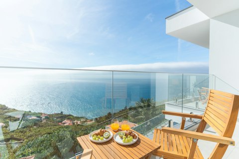 Take breakfast above the coastline with all of Madeira laid out below
