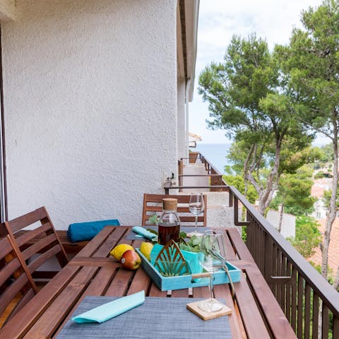 Enjoy watching the sunset from the seating area on the balcony