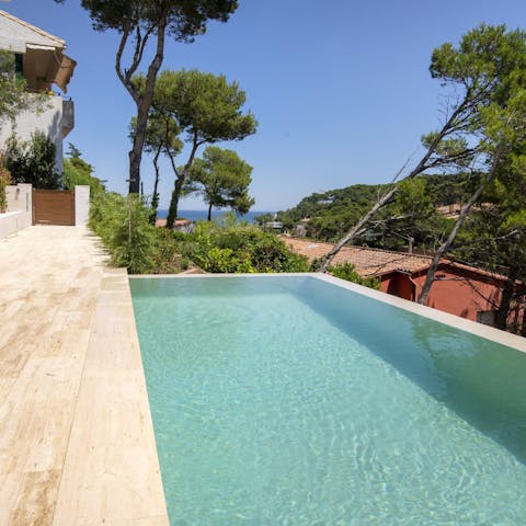 Head down to the shared infinity pool and enjoy cooling off while enjoying sea views
