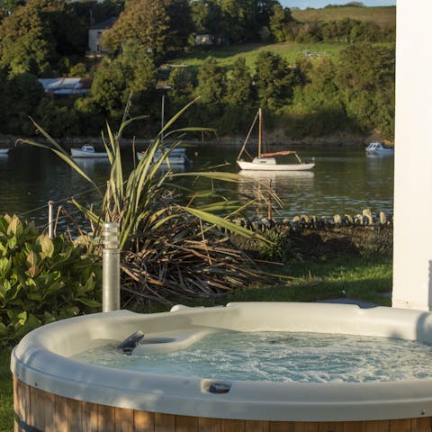 Enjoy idyllic views while relaxing in the hot tub 