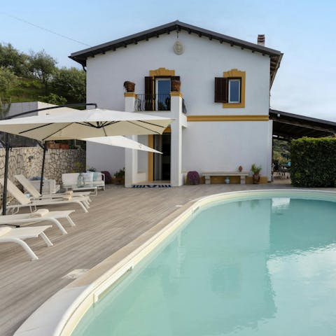 Admire the sea views from the private sun terraces and pool