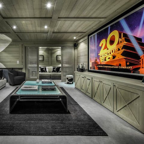 End the day with a cosy night at the movies in the home cinema