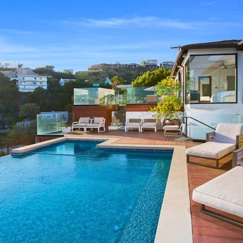 Laze around the private pool on sunny days