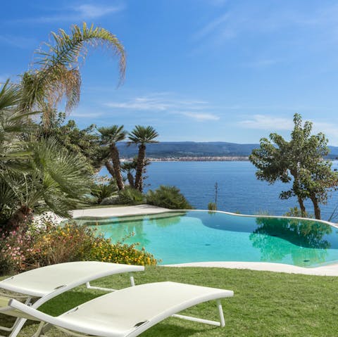 Soak up the Sardinian sun from in or beside the private pool