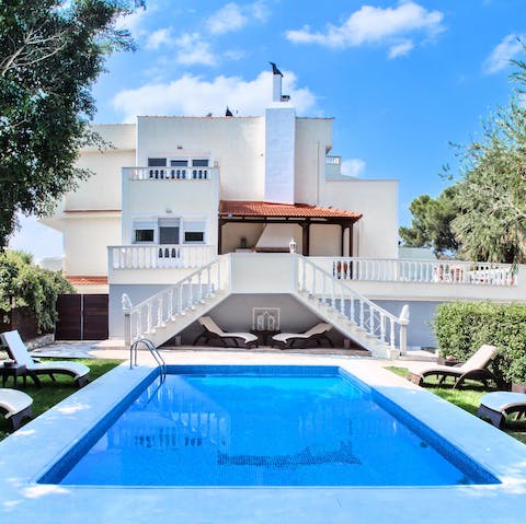 Swim in the pool surrounded by trees