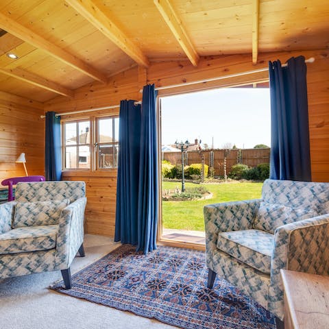 Get cosy in the log cabin – it has wi-fi so you can even work if you need to