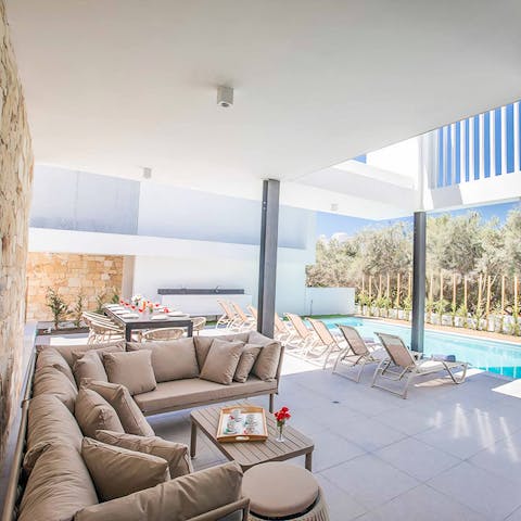 Find shade in the outdoor living space or gather for lunch at the alfresco dining area