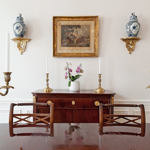 Admire the antiques adorning the apartment