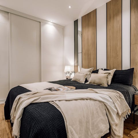 Sink into the comfortable bed after a day of Madrid sightseeing