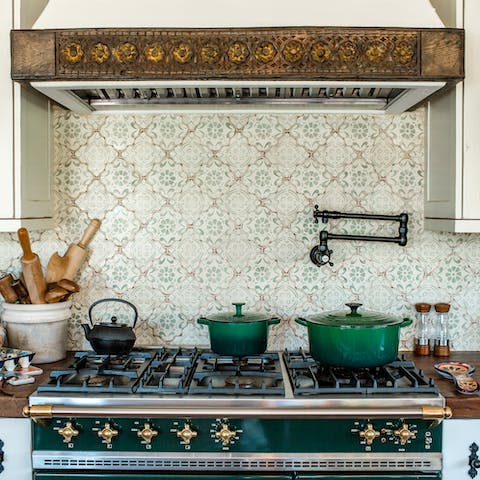 The kitchen's green colour palette