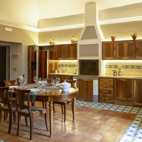 Embrace the home's history with old hearths in farmhouse-style kitchens