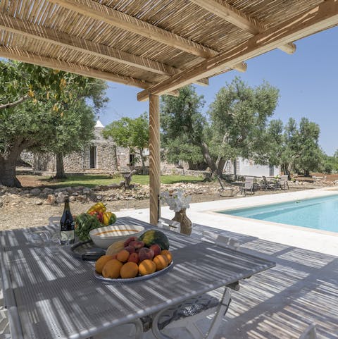 Enjoy an alfresco meal on the covered terrace