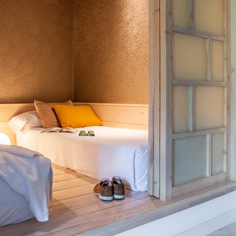 Snuggle up in the second bedroom with sliding doors – sure to be popular with the kids