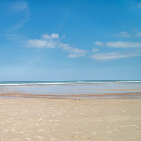 Swap poolside lounging for beach lounging at Plage de la Salis, fifteen-minute walk away