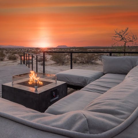 Light one of the fire pits as the sun sets and wait for the stars to come out