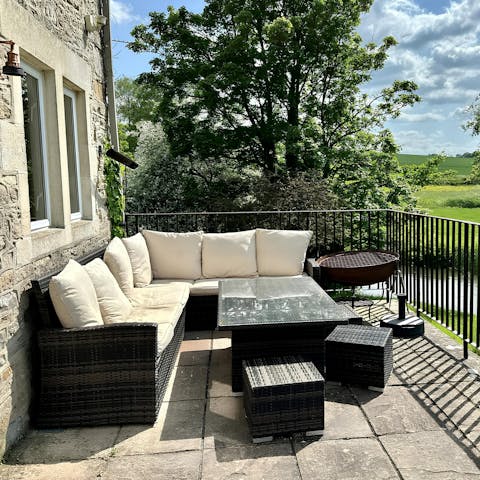 Sip sundowners with views of the river below