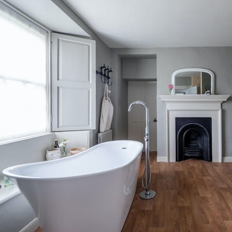 Sink into the bathtub for a relaxing evening soak
